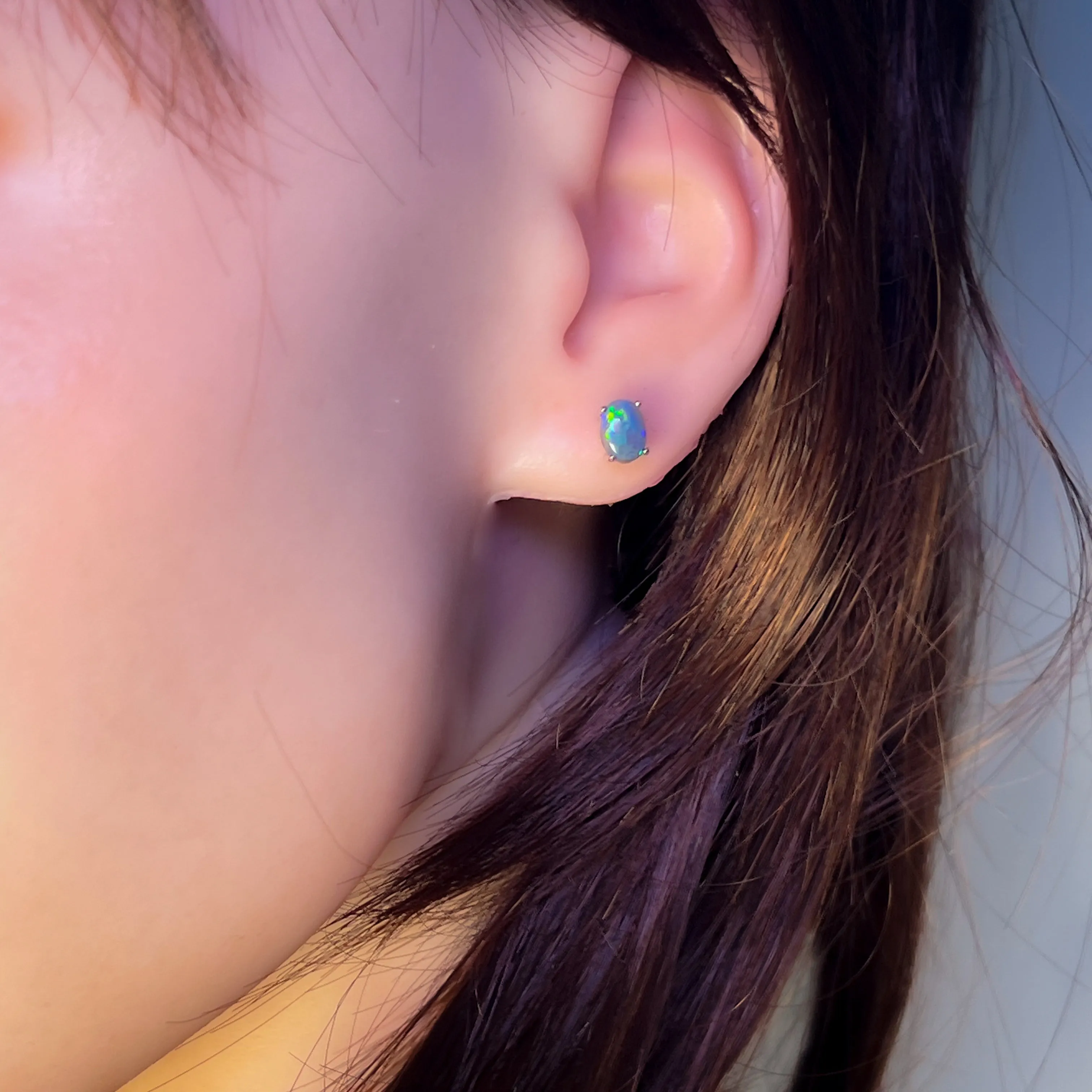 18kt pair of Black Opal Oval 1.16ct studs