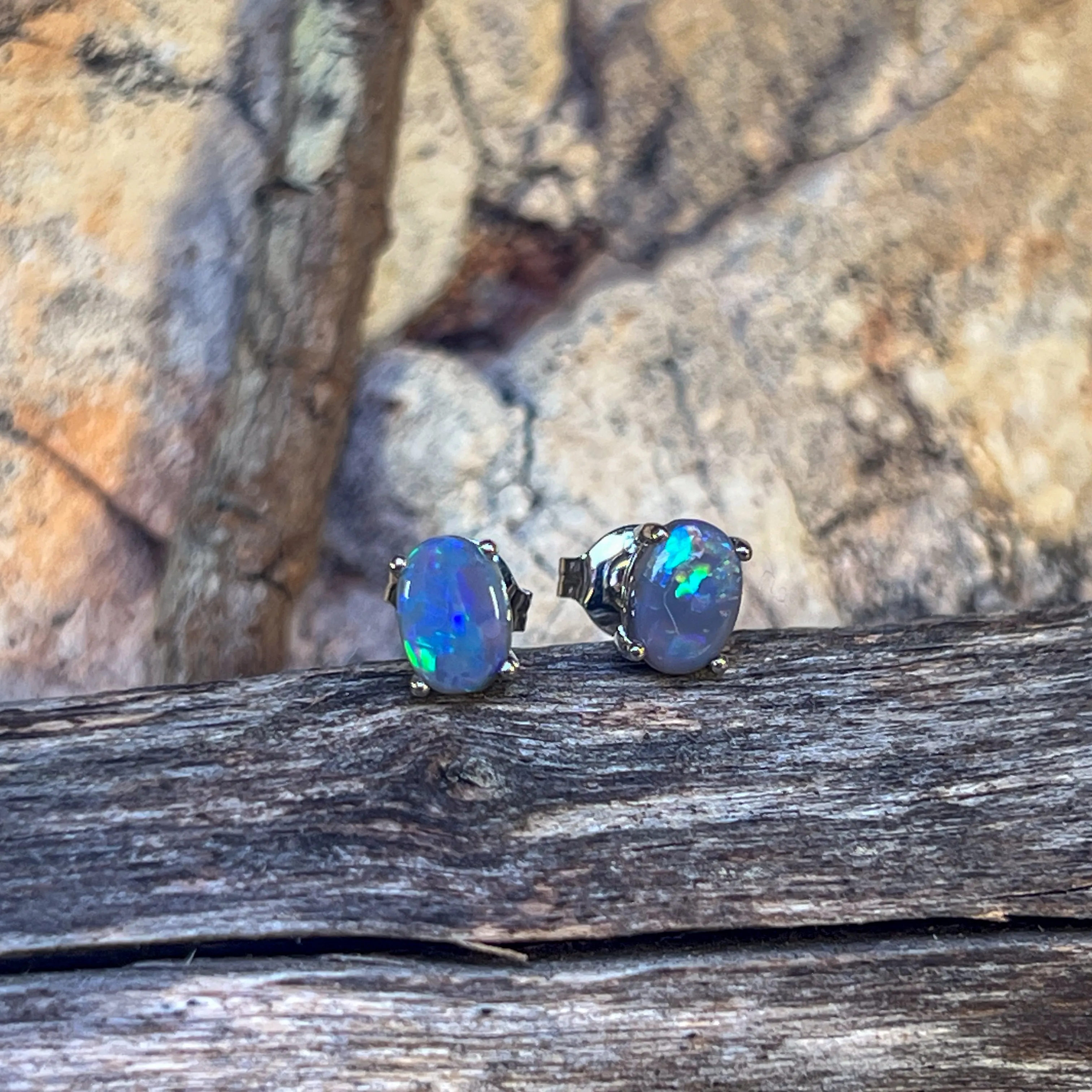 18kt pair of Black Opal Oval 1.16ct studs