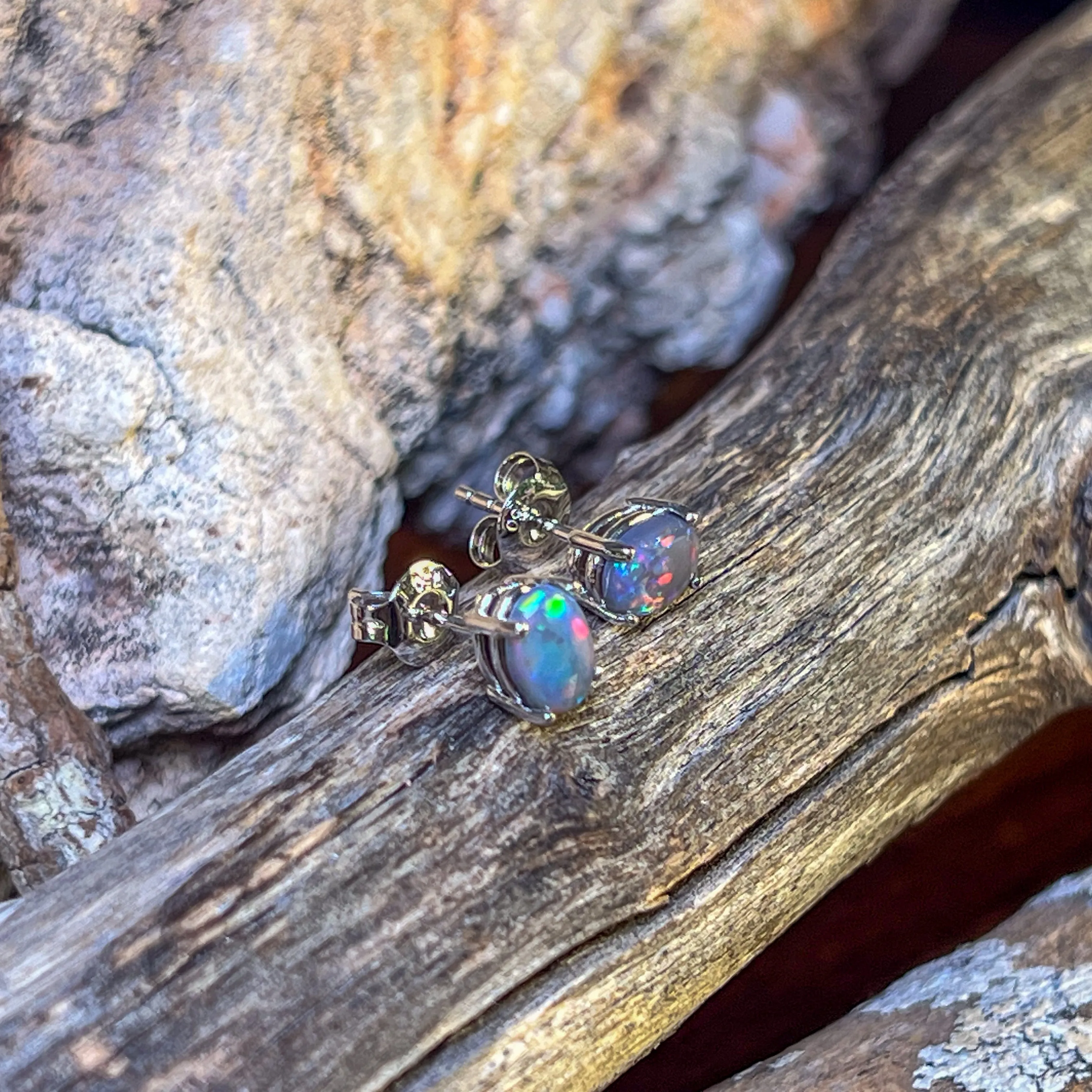 18kt pair of Black Opal Oval 1.16ct studs