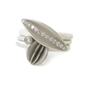 Contemporary silver, 18ct gold and diamond ring