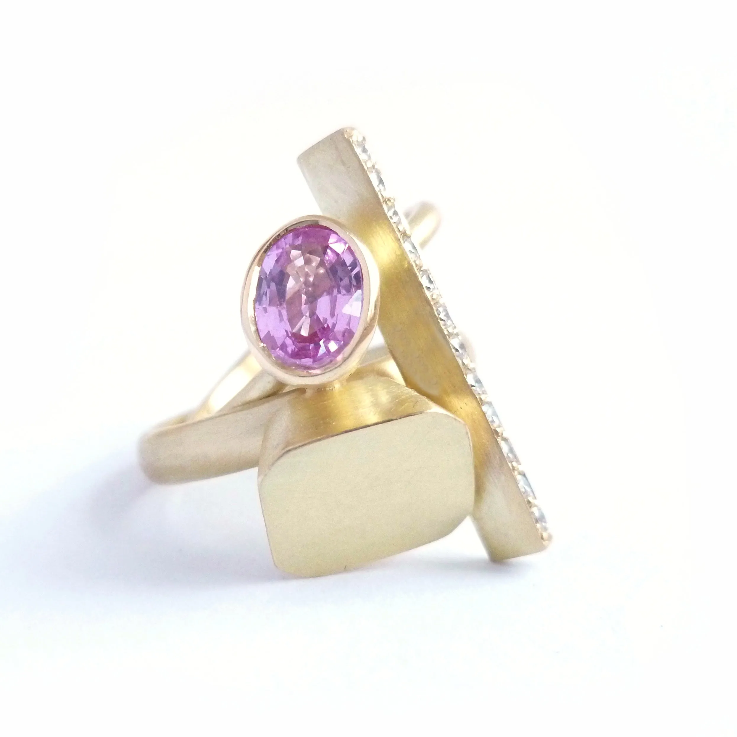 Pink sapphire and diamond and yellow gold ring