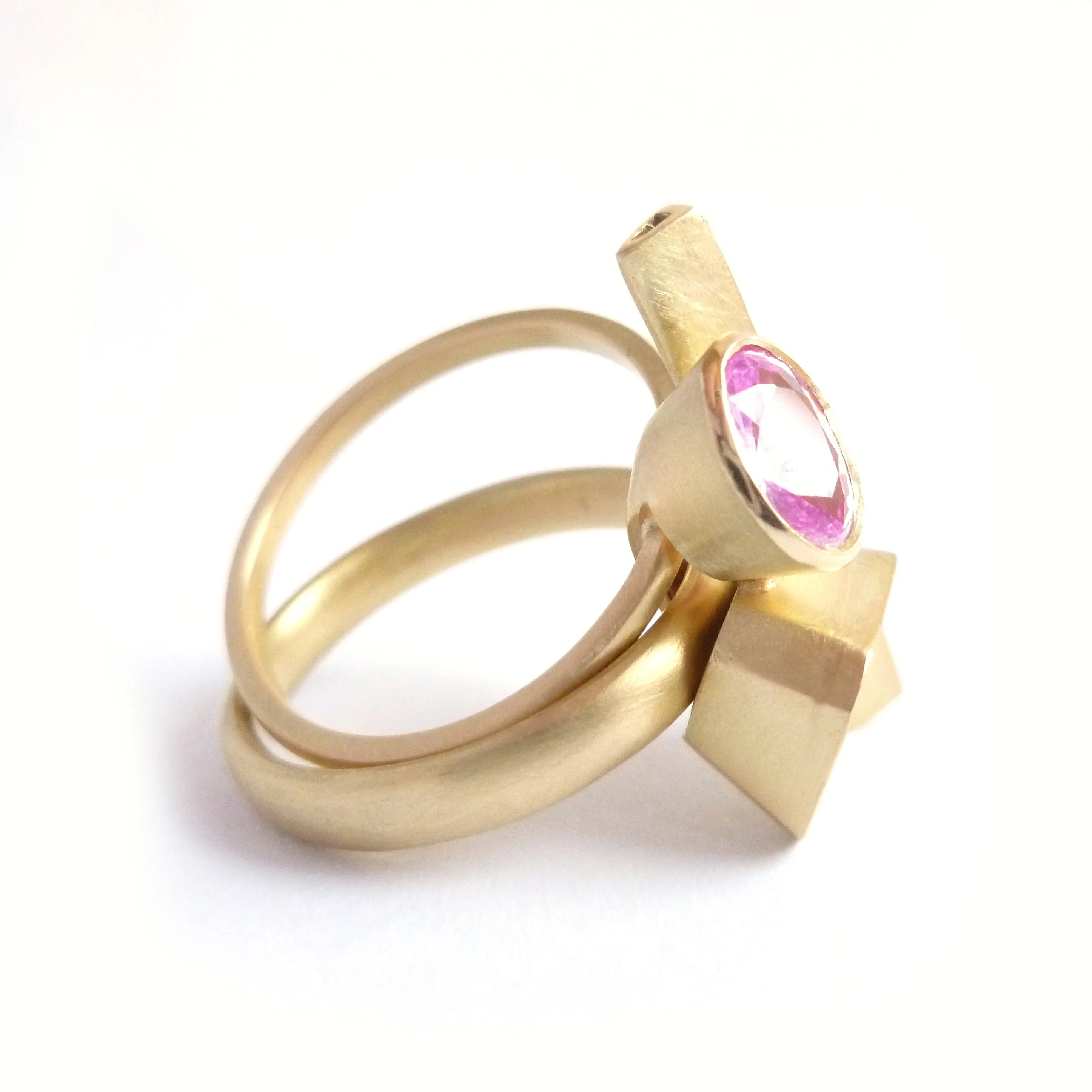 Pink sapphire and diamond and yellow gold ring