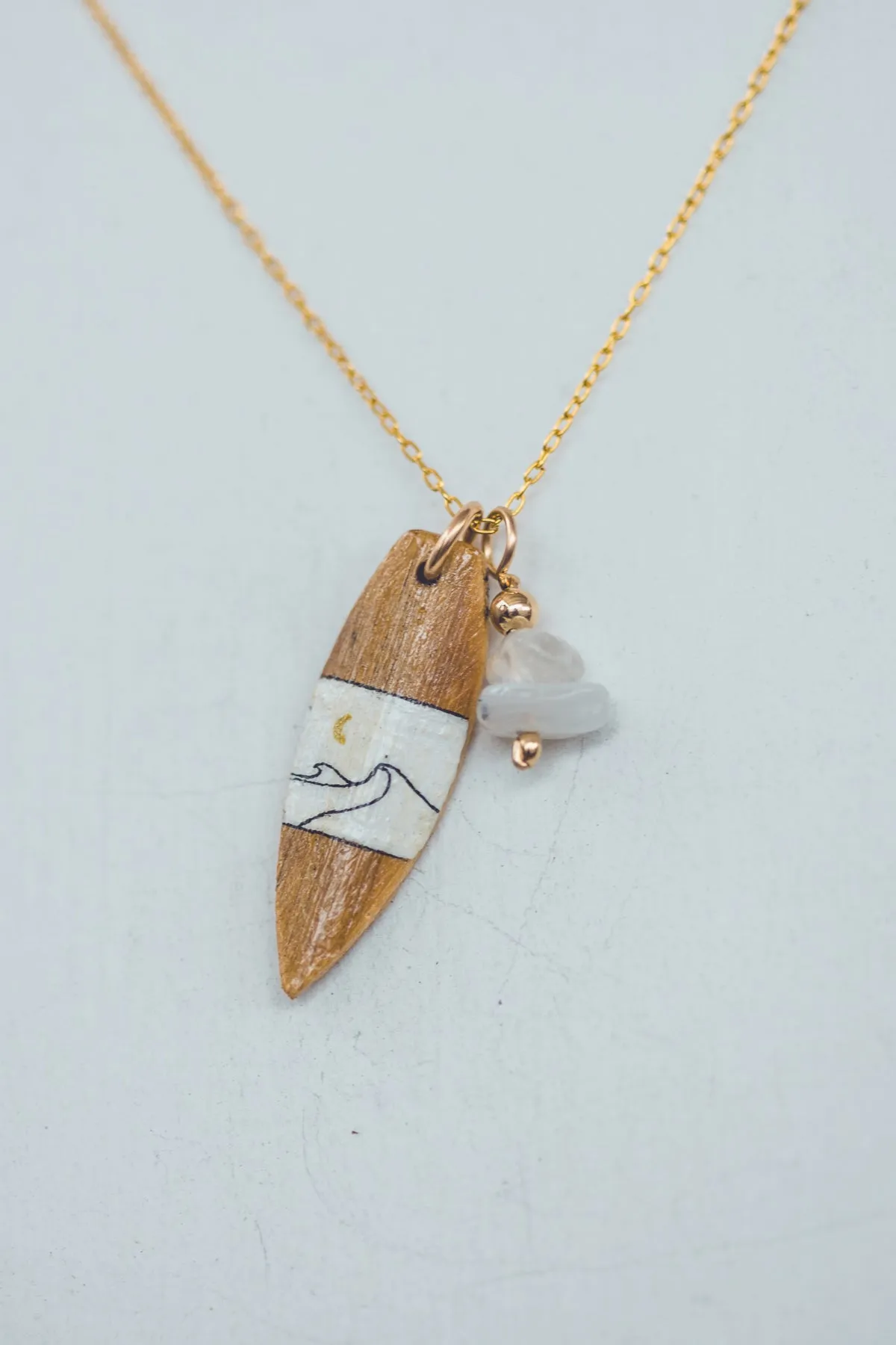 UNIQUE SURF GOLD NECKLACE